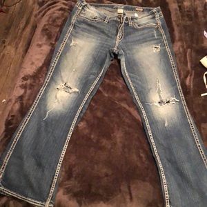 Ripped boot cut jeans